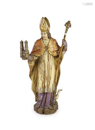 A 19th century German painted carved wood figure of St Ludge...