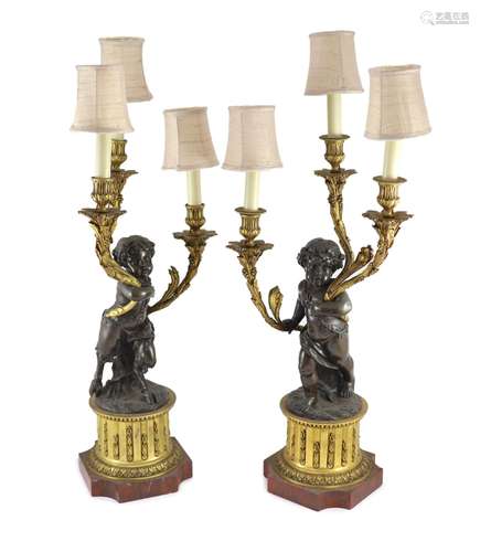 A pair of 19th century French bronze and ormolu three light ...