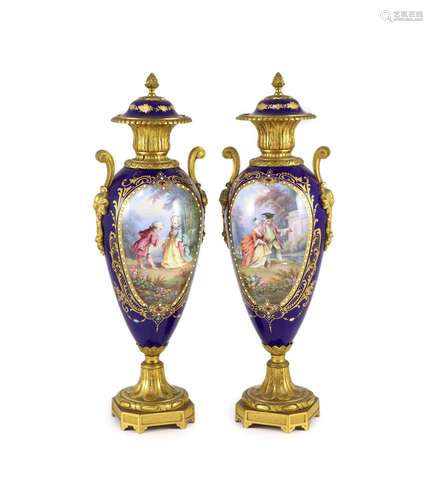 A pair of Sevres style ‘jewelled’ porcelain and ormolu mount...