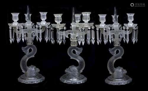 A pair of Baccarat moulded and frosted glass candelabra and ...