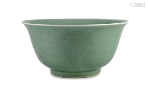 A fine large Chinese moulded celadon-glazed bowl, Qianlong s...