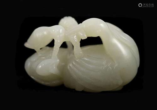 A Chinese pale celadon jade ‘ducks and millet’ group 5.7 cm