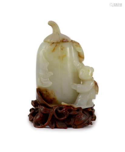 A Chinese pale celadon and russet jade 'boy' jar a...