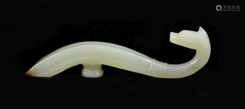 A Chinese pale celadon and brown jade belt hook, 9 cm long