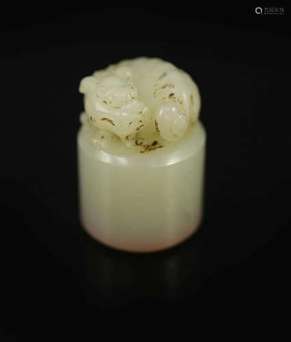 A Chinese white jade cylindrical seal, 3.5 cm high