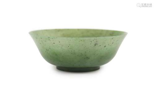 A Chinese spinach green jade bowl, 19th century 22 cm diamet...