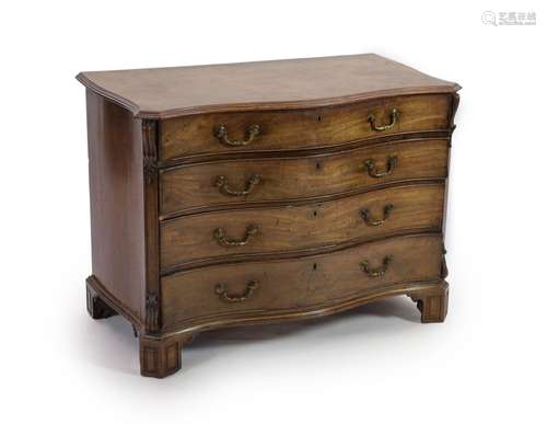 A George III Chippendale style mahogany serpentine commode W...