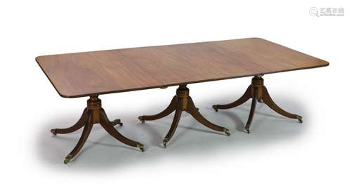 A Regency and later mahogany triple pedestal dining table, W...