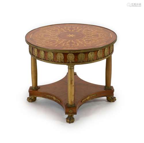 A French empire style ormolu mounted marquetry centre table ...