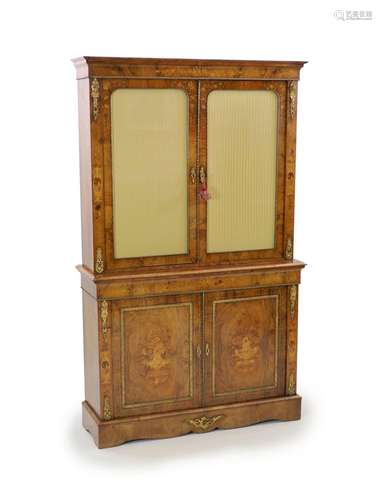 A Victorian ormolu mounted marquetry inlaid walnut bookcase,...