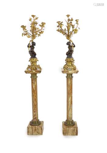 A pair of 19th century French bronze and ormolu six light ca...