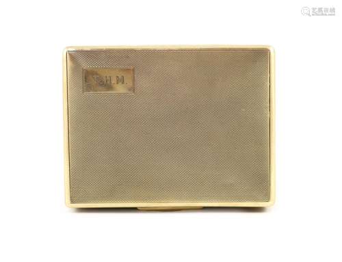 A late 1920's George V engine turned 9ct gold rectangul...