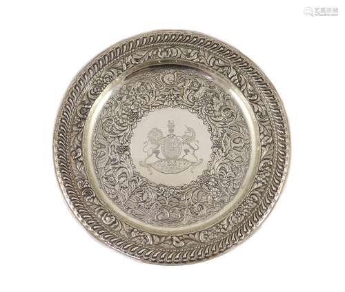 A George IV Irish embossed silver charger, by Stephen Bergin...