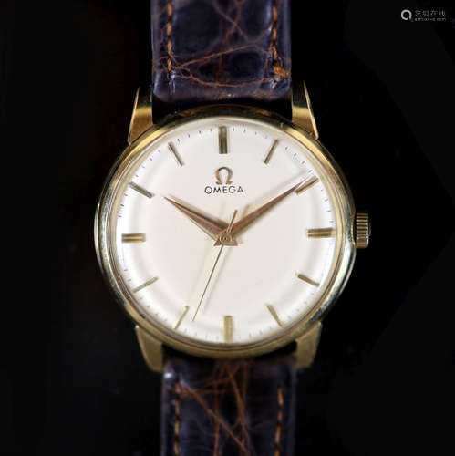 A gentleman's late 1950's 18ct gold Omega manual w...