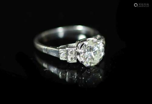 A platinum and single stone diamond ring, with six stone ros...