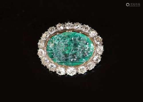 A possibly Roman oval intaglio emerald, mounted in an early ...