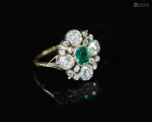 A 19th century gold and silver, emerald and diamond cluster ...