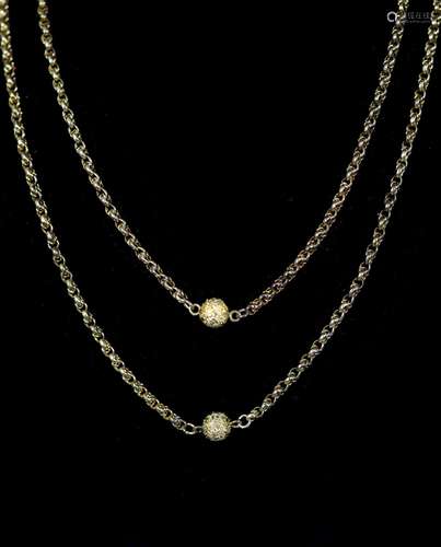 A 19th century 9ct gold guard chain with seven engraved sphe...