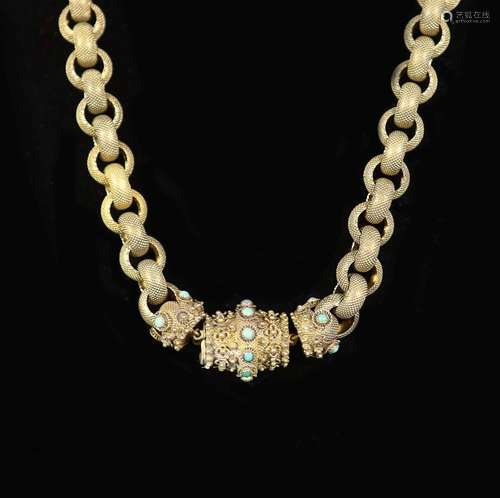 An early 19th century textured gold circular link muff chain...