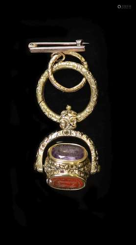 An early 19th century gold overlaid and three stone set swiv...