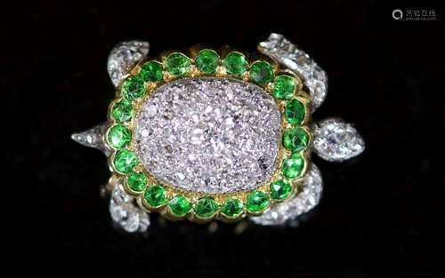 A platinum, pave set diamond and demantoid garnet set tortoi...