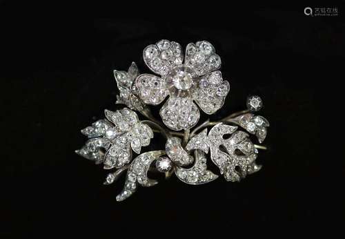 A Victorian gold, silver and diamond encrusted floral spray ...