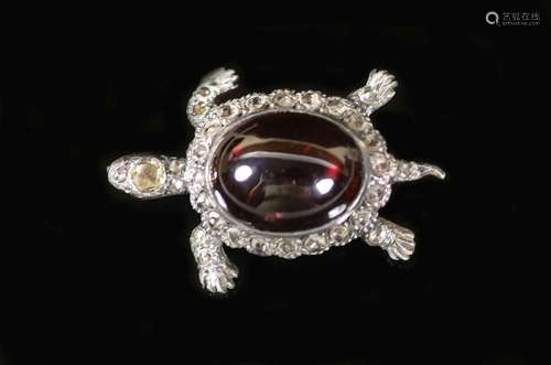 An Edwardian gold and silver, cabochon garnet and diamond se...