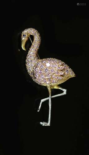 A modern two colour 18ct gold and diamond encrusted brooch, ...