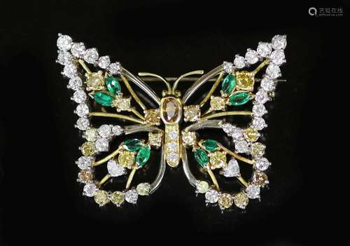 A modern white and yellow gold, diamond, emerald and citrine...