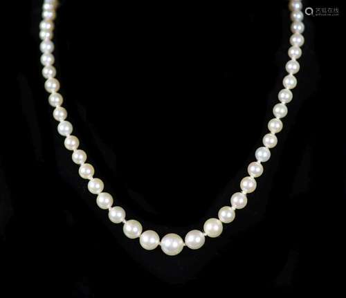 A mid 20th century single strand graduated pearl necklace, w...