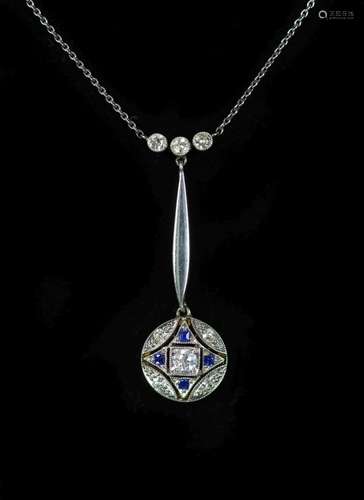 An Edwardian gold and platinum, millegrain set sapphire and ...