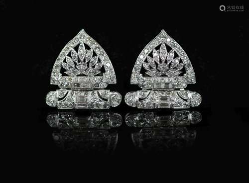 A pair of 1960's pierced platinum and diamond fan shape...