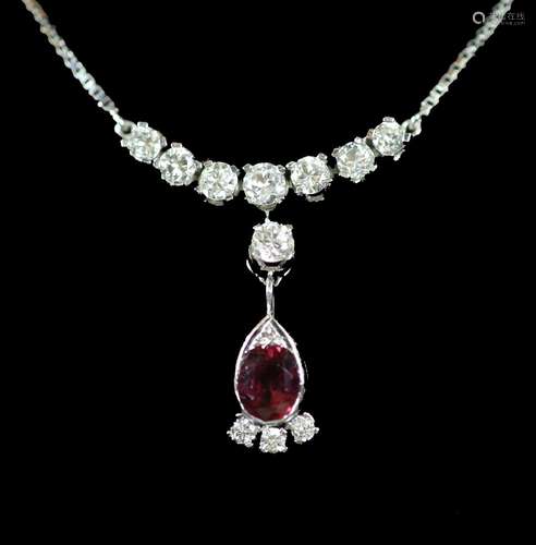 A modern Italian 18ct white gold, single stone oval cut ruby...