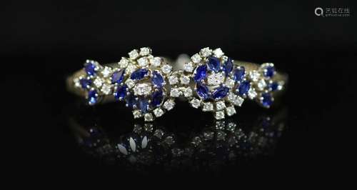 A 18ct white gold sapphire and diamond set double cluster br...