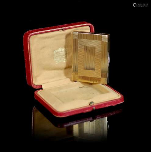 A 1930's Cartier 9ct gold compact, with diamond set thu...