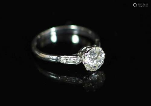 An 18ct white gold and single stone diamond ring