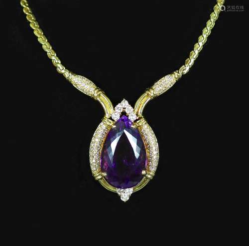 A French Boucheron gold, pear shaped amethyst and diamond cl...