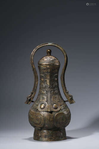 A Chinese Bronze Phoenix Vessel, Hu