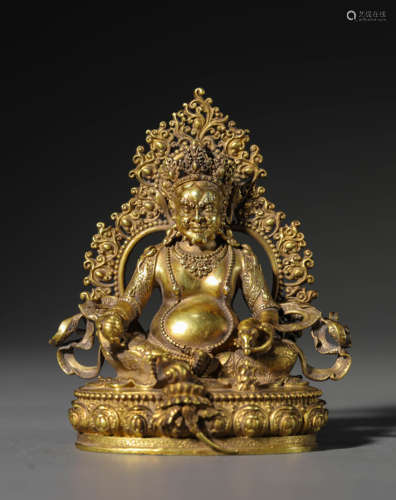 A Chinese Gold Plated Sterling Silver   Kuberd Statue