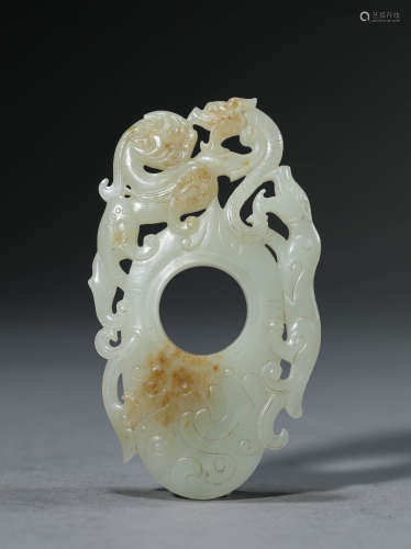 A Chinese White Jade Dragon Pendant