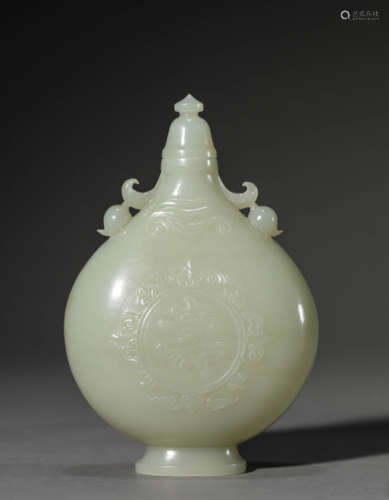 A Chinese White Jade Fu and Shou Vase and Cover