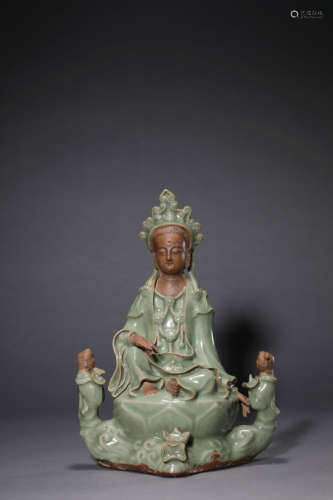 A Chinese Porcelain Long Quan Guan Yin Statue