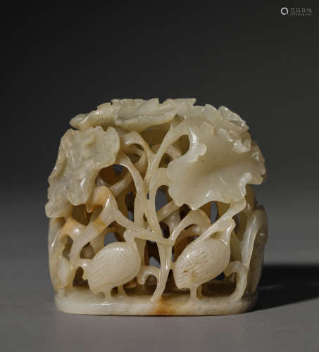 A Chinese White Jade Lotus and Egret Carving