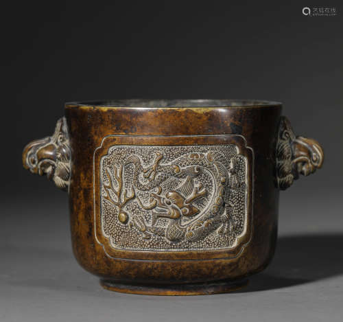A Chinese Bronze Dragon Censer