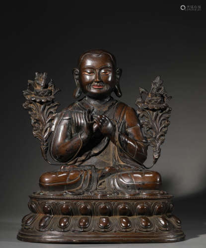 A Chinese Bronze Guru Statue