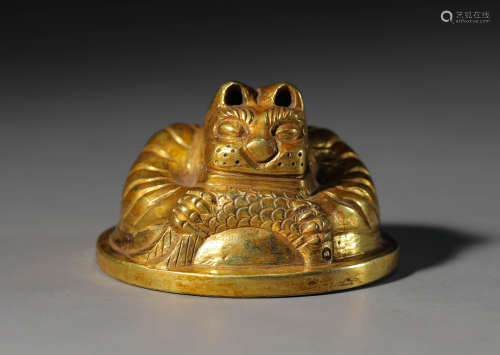 A Chinese Gilt-Bronze Beast Paper Weight