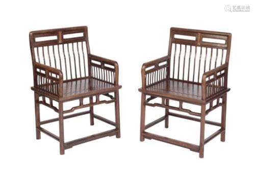 A PAIR OF CHINESE 'HUANGHUALI' COMB-BACK CHAIRS, PROBABLY EA...