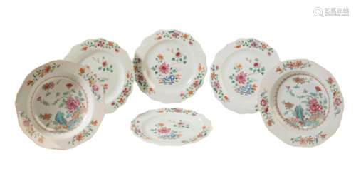 A SET OF FOUR CHINESE FAMILLE ROSE PLATES