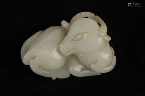 A CHINESE PALE CELADON JADE BUFFALO,