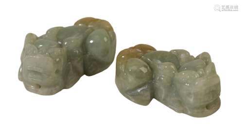 A PAIR OF CHINESE JADE DRAGONS